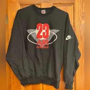 Nike size large black sweatshirt with white and red Jordan design